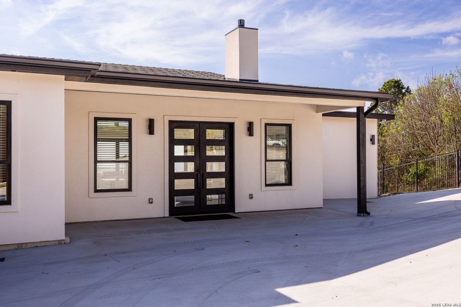 Exterior details and patio area of a home in , Kerrville (Image 29).