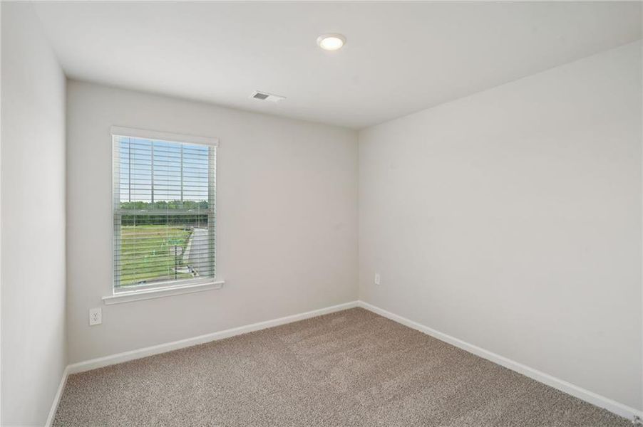 Spacious, unfurnished interior of a new home in Avalon - Vista Series, Conyers (Image 24). Spacious, unfurnished interior of a new home in Avalon - Vista Series, Conyers (Image 24).