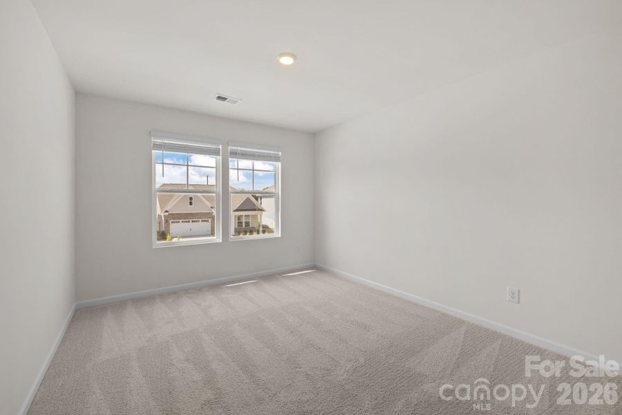 Spacious, unfurnished interior of a new home in McFarland Estates, York (Image 28).