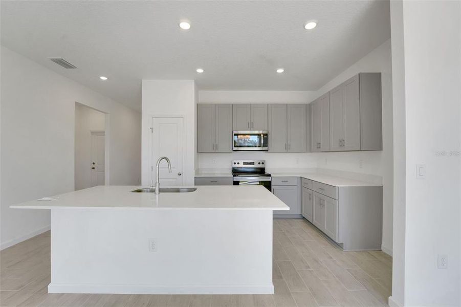 Furnished interior view inside a new home in Willowbrook North, Winter Haven (Image 6).