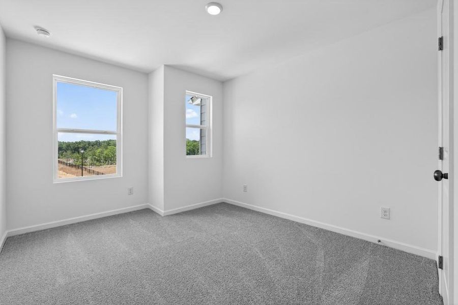 Spacious, unfurnished interior of a new home in Weatherfield, Buford (Image 34).