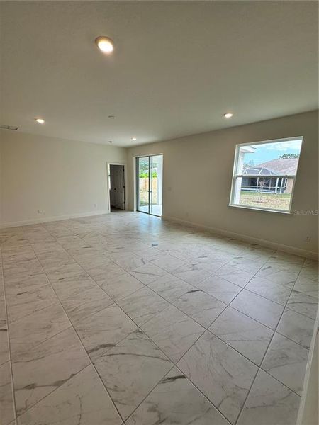 Spacious, unfurnished interior of a new home in Palm Coast: Cornerstone Collection, Palm Coast (Image 13).