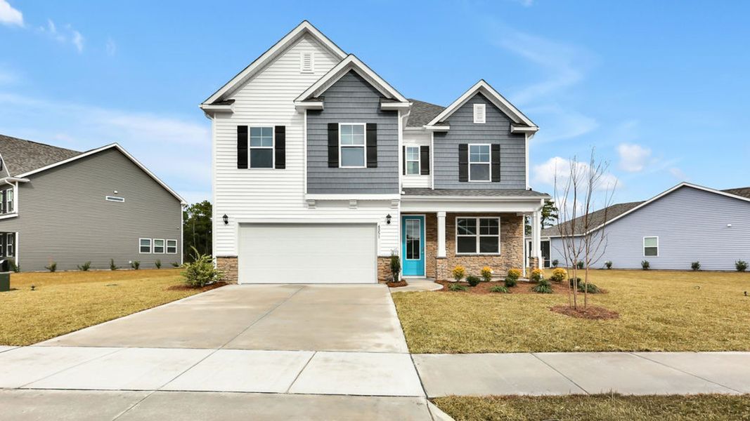 Front exterior of a new home in Grayson Park, Leland, NC, highlighting curb appeal (Image 1). Front exterior of a new home in Grayson Park, Leland, NC, highlighting curb appeal (Image 1).