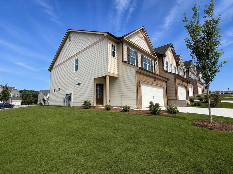 Front exterior of a new home in Somerset at Riverbrook, Gainesville, GA, highlighting curb appeal (Image 22).