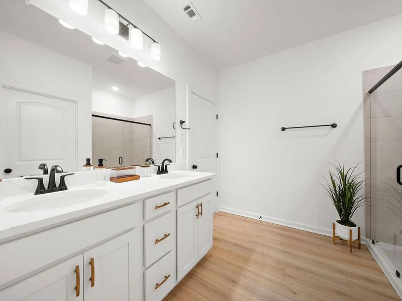 Furnished interior view inside a new home in Sunterra, Katy (Image 6).