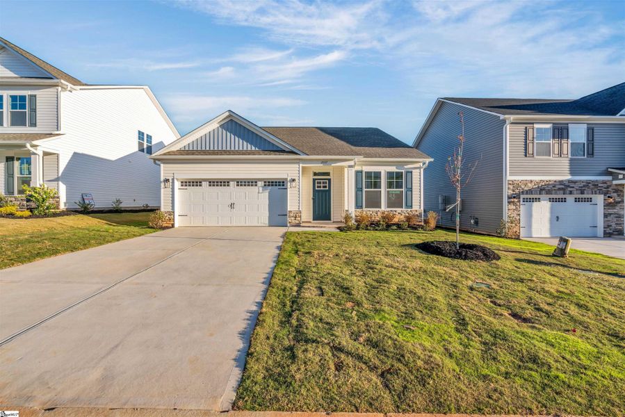 Front exterior of a new home in Halton Oaks, Spartanburg, SC, highlighting curb appeal (Image 19).