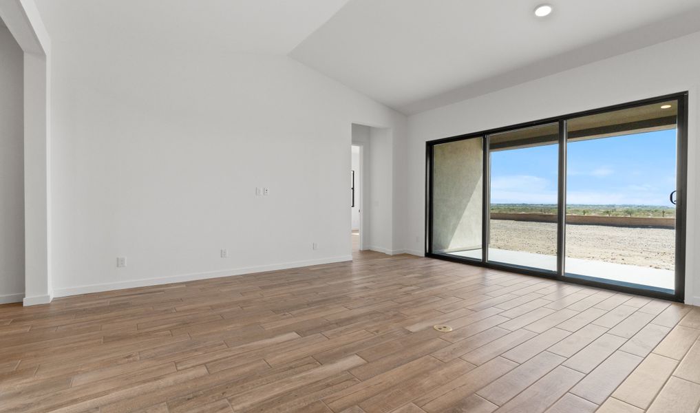 Great room with multi-slide glass doors to covered patio Great room with multi-slide glass doors to covered patio