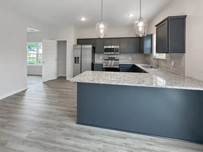Furnished interior view inside a new home in Tranquil South, Hinesville (Image 7).