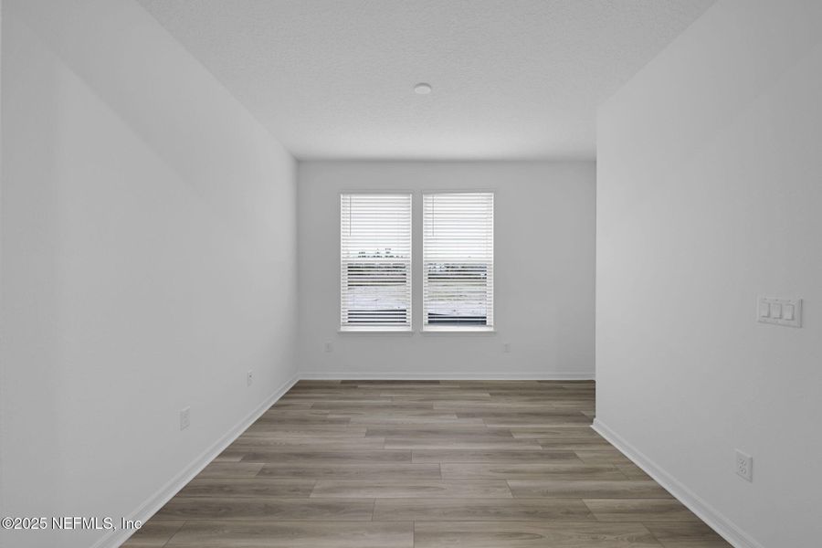 Spacious, unfurnished interior of a new home in Del Webb Wildlight, Yulee (Image 15).