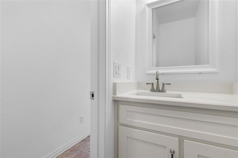 Bathroom with vanity and tile patterned flooring Bathroom with vanity and tile patterned flooring