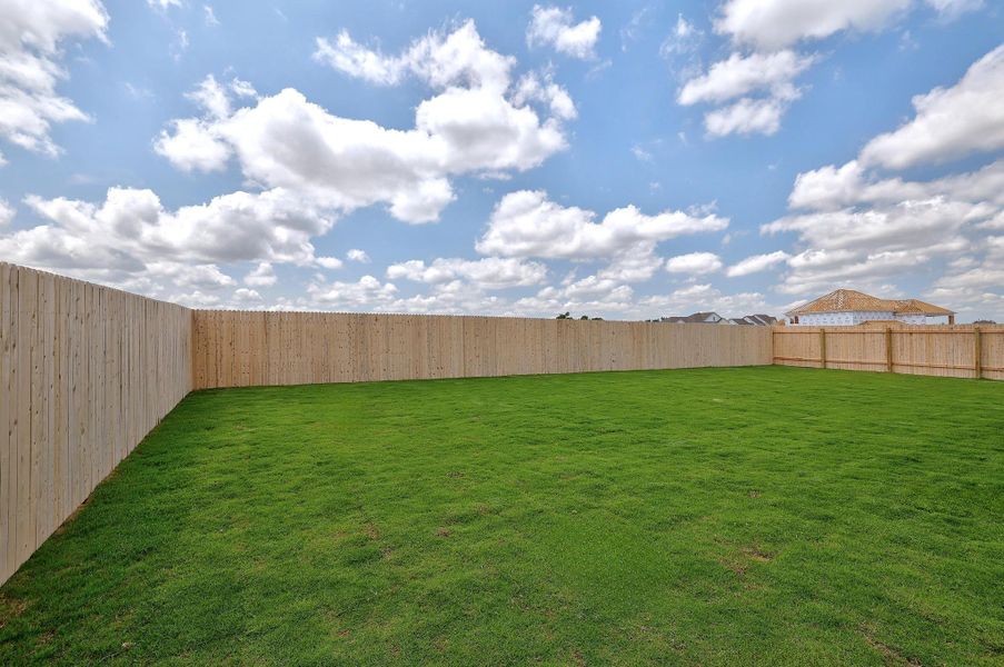 Exterior details and patio area of a home in Santa Rita Ranch, Liberty Hill (Image 3).