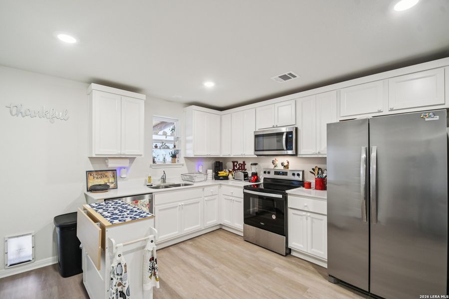Furnished interior view inside a new home in , San Marcos (Image 16).