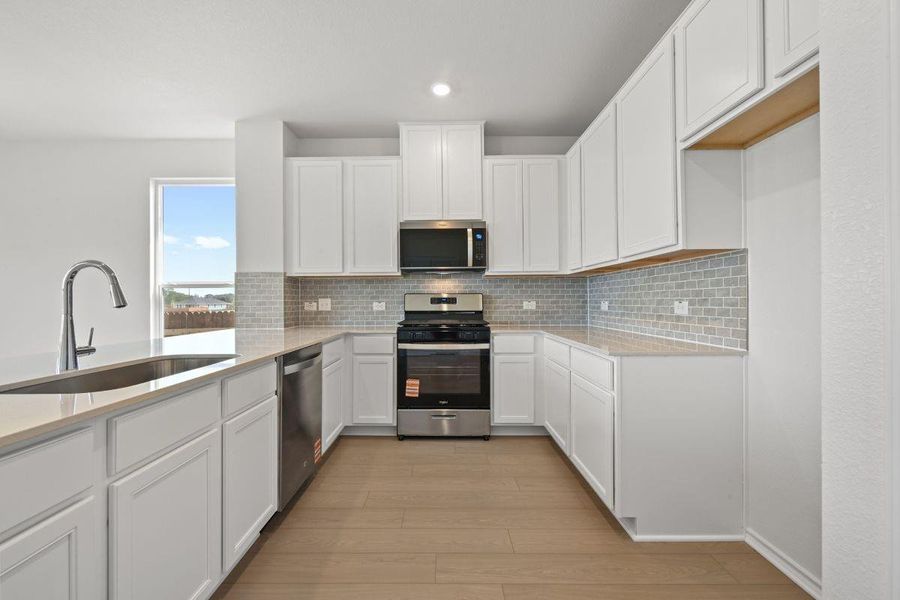 Furnished interior view inside a new home in Watermill-Classic Collection, Uhland (Image 5).