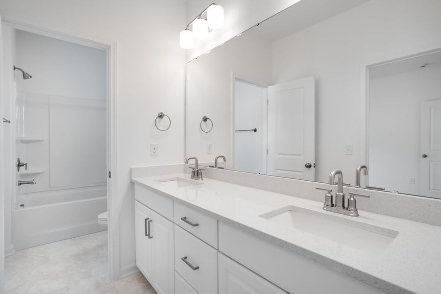 Representative furnished interior of a home built from the Leland by Taylor Morrison in Stafford at Langtree, Mooresville (Image 28).
