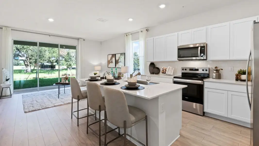 Furnished interior view inside a new home in Towns at Summit, Deland (Image 3).