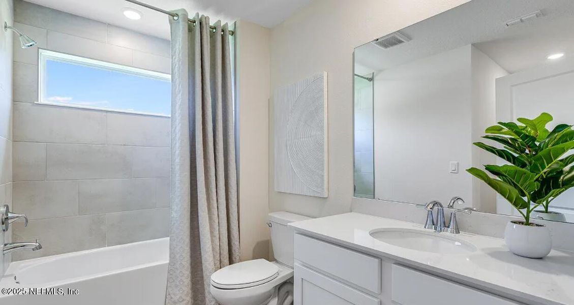 Furnished interior view inside a new home in Russell Retreat, Green Cove Springs (Image 13).