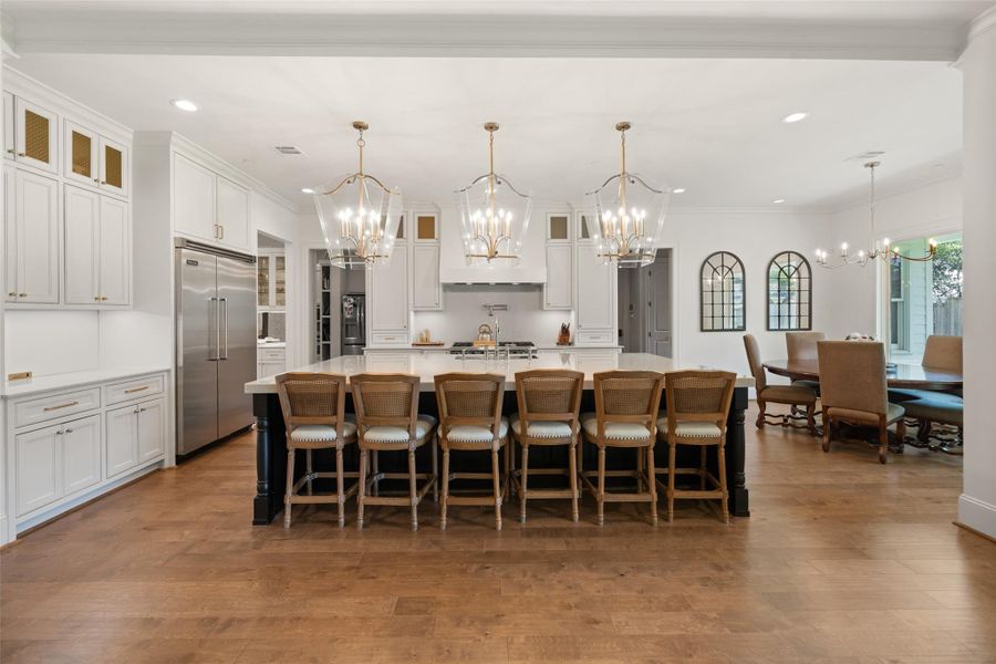 Kitchen features an expansive island large enough to fit 6 people comfortably.