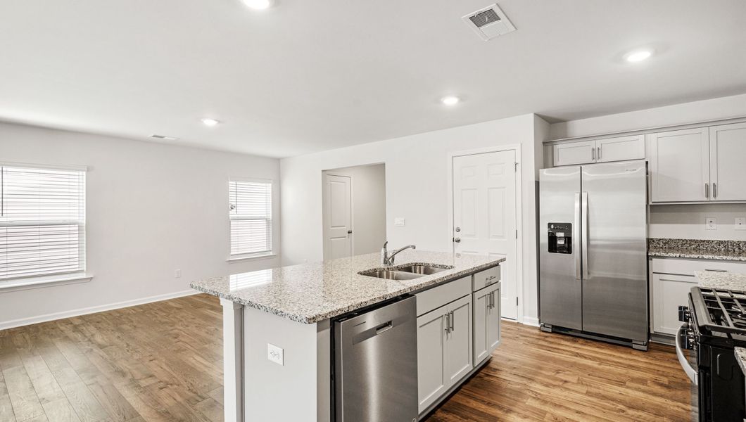 Furnished interior view inside a new home in Paddock Point, Roebuck (Image 8).