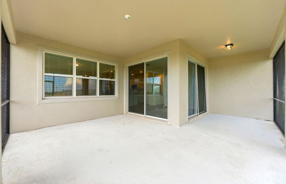 Exterior details and patio area of a home in Seaire, Parrish (Image 3).