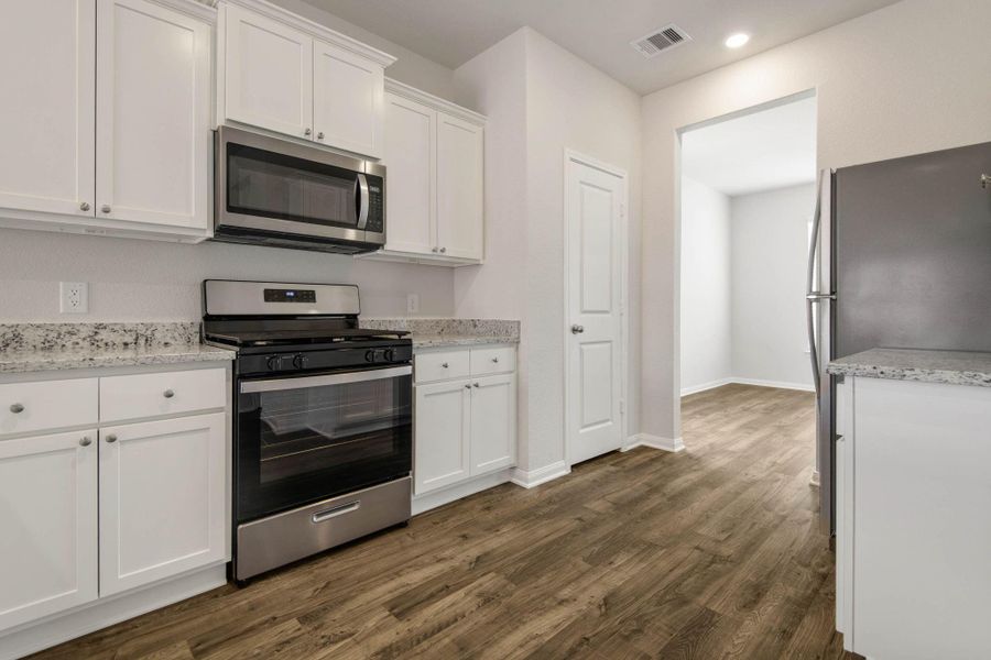 Furnished interior view inside a new home in Trails at Cochran Ranch, Waller (Image 7).