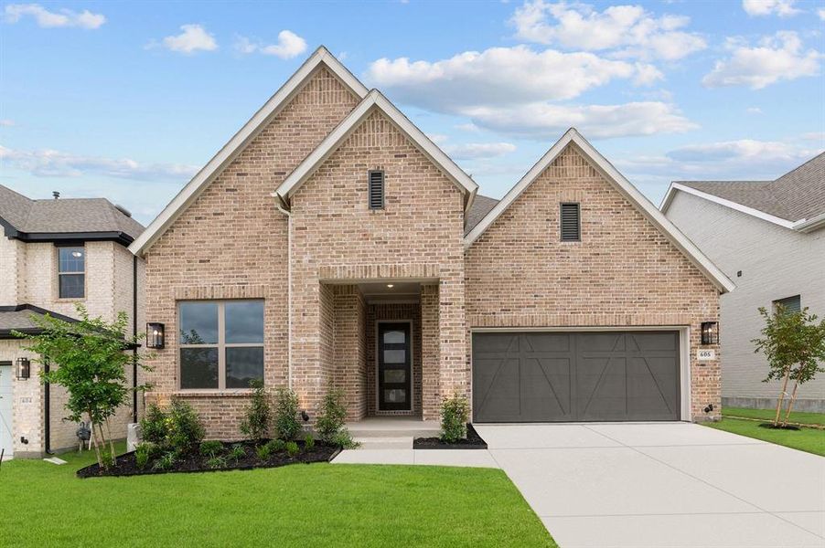 Front exterior of a new home in South Pointe  Cottage Series, Mansfield, TX, highlighting curb appeal (Image 1).