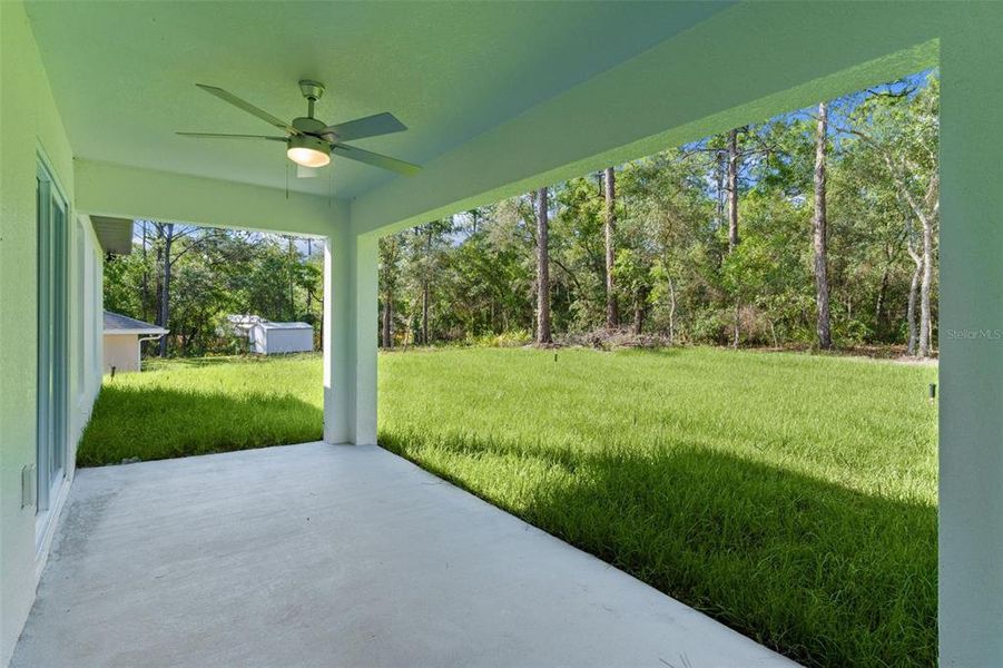 Exterior details and patio area of a home in , Citrus Springs (Image 27).
