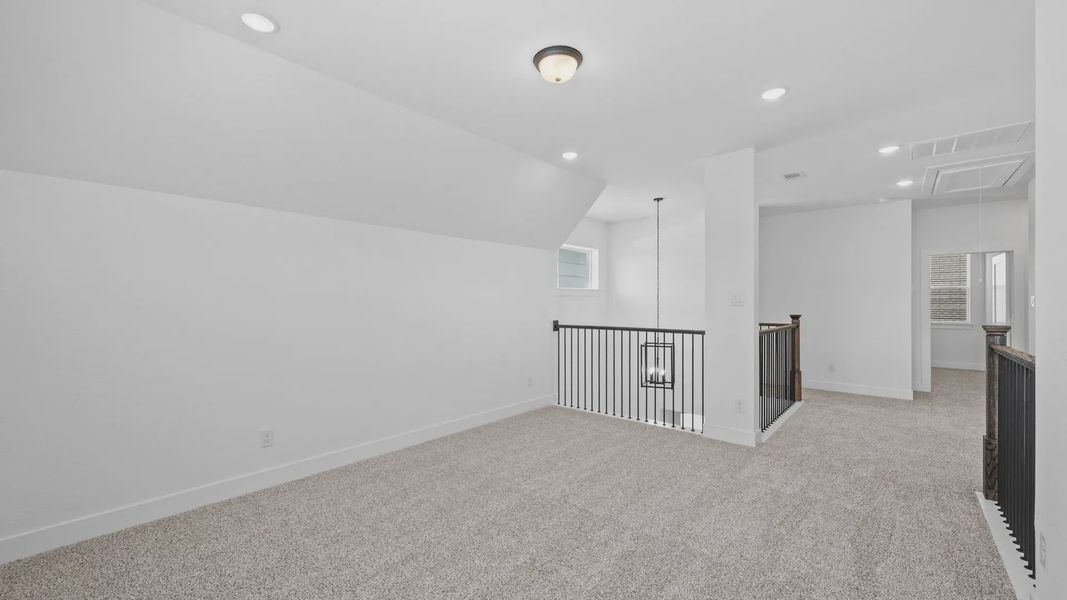Representative unfurnished interior of a home built from the Rivers by Chesmar Homes in Sofi Lakes, Katy (Image 32).