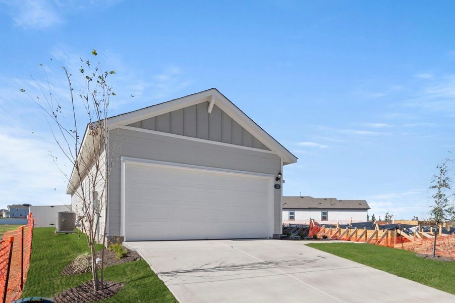 Front exterior of a new home in Harvest Ridge, Elgin, TX, highlighting curb appeal (Image 23).