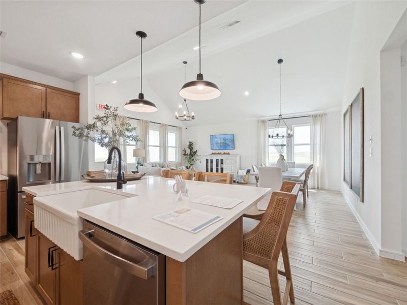Stunning kitchen with chestnut brown cabinets and quartz counters (*Photo not of actual home and used for illustration purposes only.) Stunning kitchen with chestnut brown cabinets and quartz counters (*Photo not of actual home and used for illustration purposes only.)