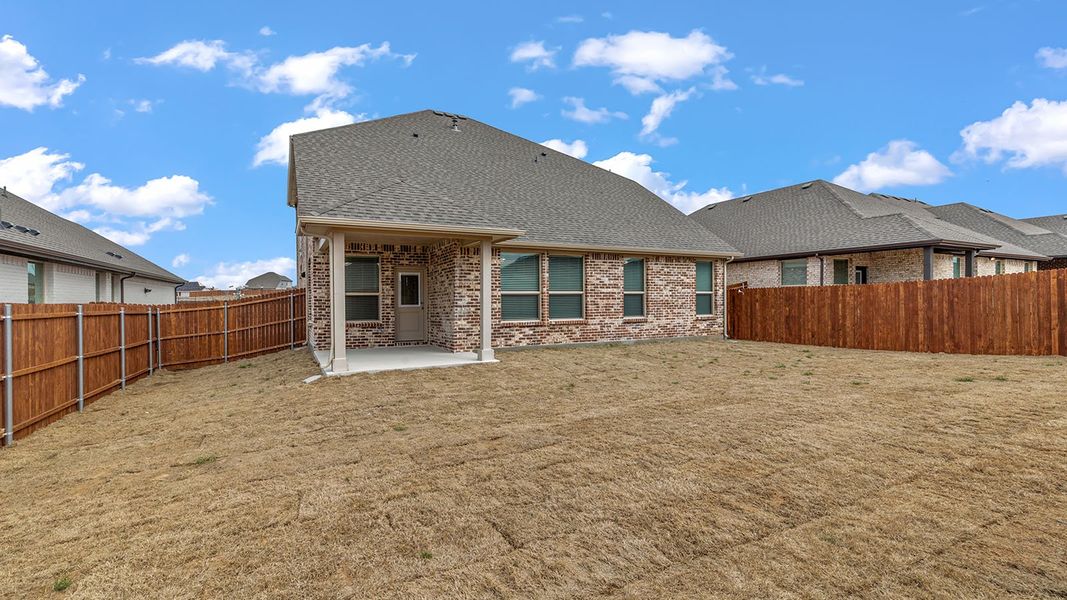 Exterior details and patio area of a home in Morningstar, Aledo (Image 3).