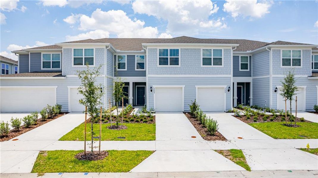 Front exterior of a new home in , Kissimmee, FL, highlighting curb appeal (Image 18). Front exterior of a new home in , Kissimmee, FL, highlighting curb appeal (Image 18).