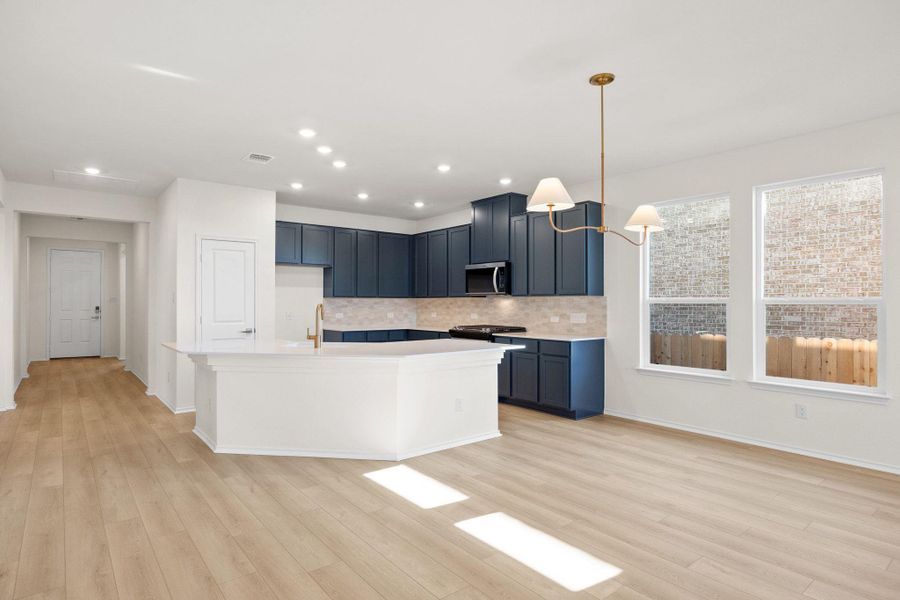 Furnished interior view inside a new home in Salerno - Classic Collection, Round Rock (Image 12). Furnished interior view inside a new home in Salerno - Classic Collection, Round Rock (Image 12).