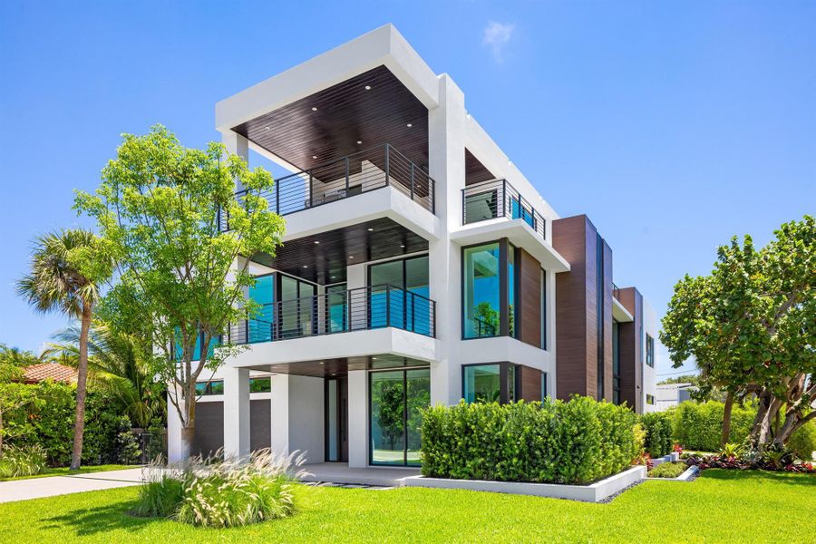 Front exterior of a new home in , Boca Raton, FL, highlighting curb appeal (Image 24). Front exterior of a new home in , Boca Raton, FL, highlighting curb appeal (Image 24).