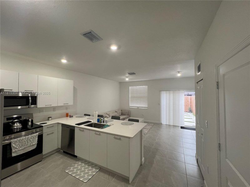 Furnished interior view inside a new home in , Miami Gardens (Image 5).