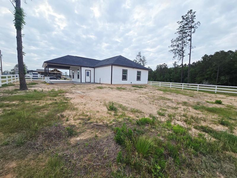 Exterior details and patio area of a home in , Conroe (Image 15).
