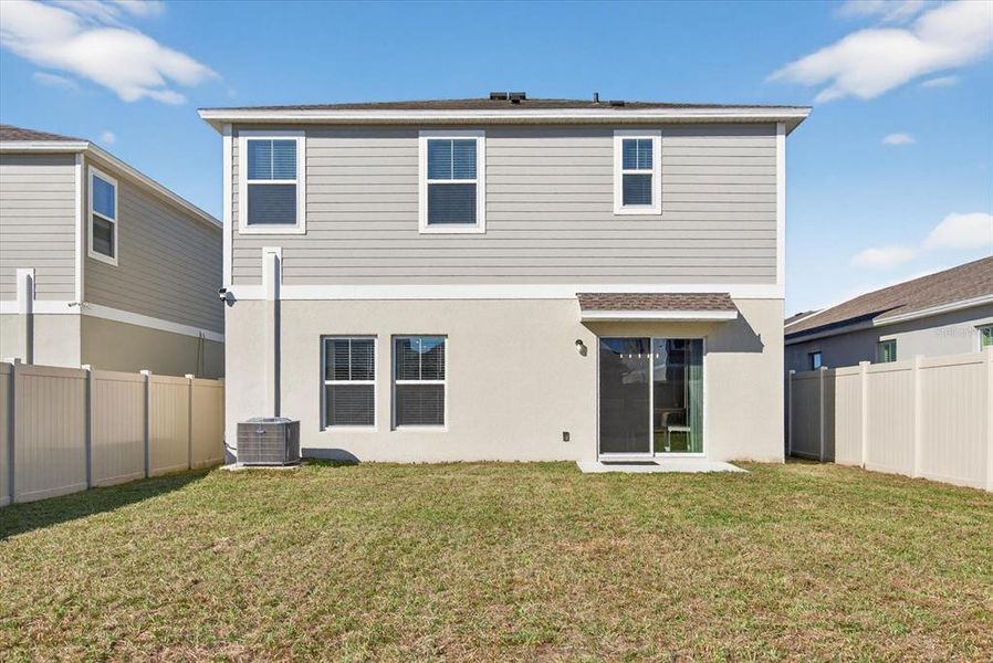 Exterior details and patio area of a home in Pasadena Point, Wesley Chapel (Image 29). Exterior details and patio area of a home in Pasadena Point, Wesley Chapel (Image 29).