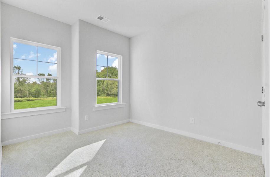 Spacious, unfurnished interior of a new home in Indigo Grove Townhomes, Johns Island (Image 23).