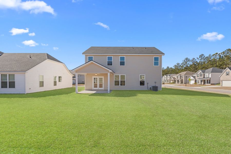 Exterior details and patio area of a home in Camden Crossing, Savannah (Image 3).