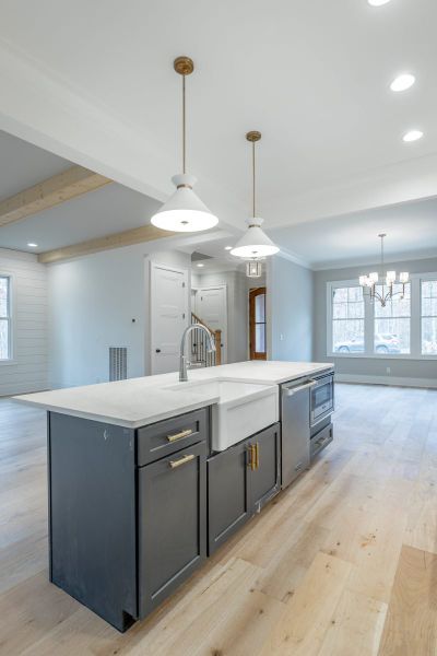 Representative furnished interior of a home built from the Carolina A by Riverstone Construction, LLC in Jasper Highlands, Guild (Image 8).