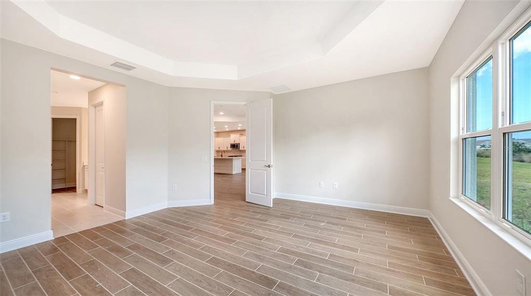 Spacious, unfurnished interior of a new home in Grand Park, Sarasota (Image 34).