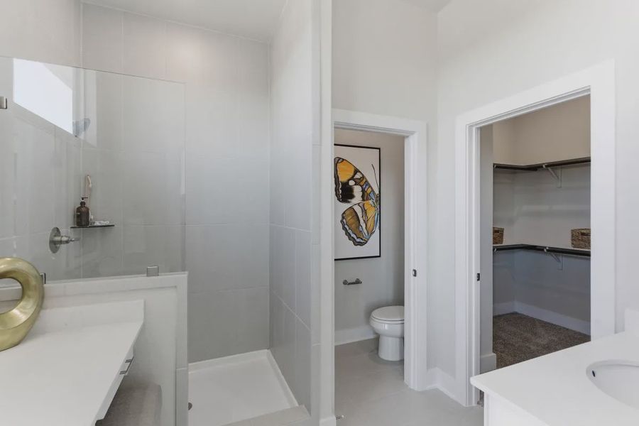 Furnished interior view inside a new home in Centero at Stone Oak, San Antonio (Image 11).