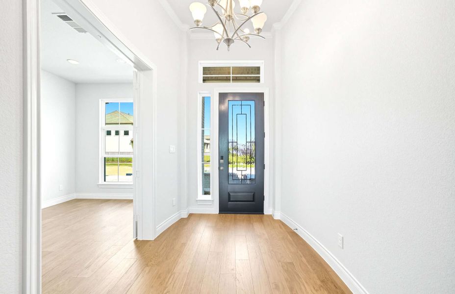 Representative unfurnished interior of a home built from the 3663 by Ravenna Homes in Artavia 70′, Conroe (Image 21).