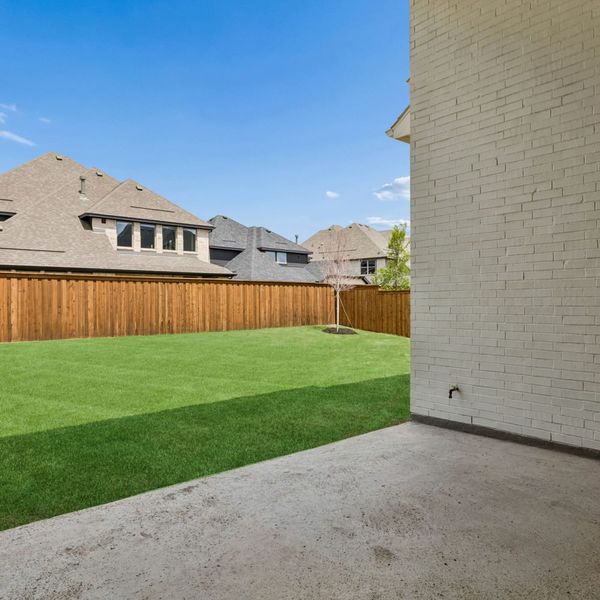 Exterior details and patio area of a home in Mosaic – 70′ Lots, Prosper (Image 29).