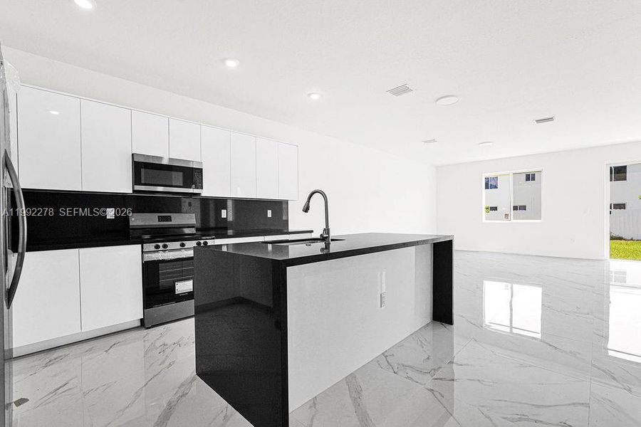 Furnished interior view inside a new home in , Miami (Image 37).