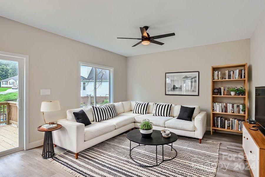 Beautiful living room and sliding doors to the fabulous back deck.