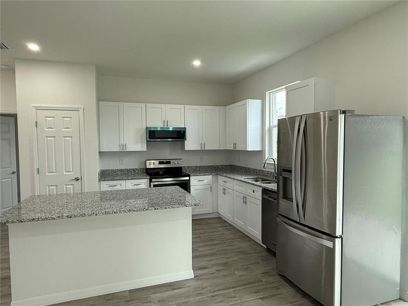 Furnished interior view inside a new home in , Port Charlotte (Image 9). Furnished interior view inside a new home in , Port Charlotte (Image 9).