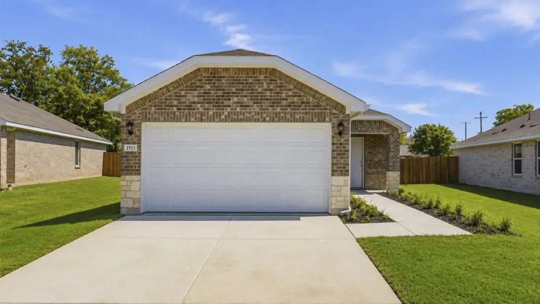 Front exterior of a new home in Asher Oaks, Bonham, TX, highlighting curb appeal (Image 2). Front exterior of a new home in Asher Oaks, Bonham, TX, highlighting curb appeal (Image 2).