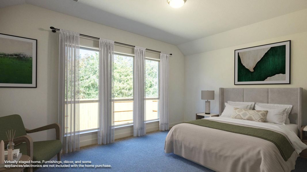 Bedroom featuring baseboards, lofted ceiling, and carpet flooring