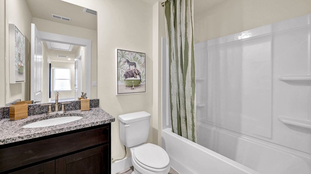 Representative furnished interior of a home built from the Darwin by D.R. Horton in Harbor Crest, Ooltewah (Image 23).