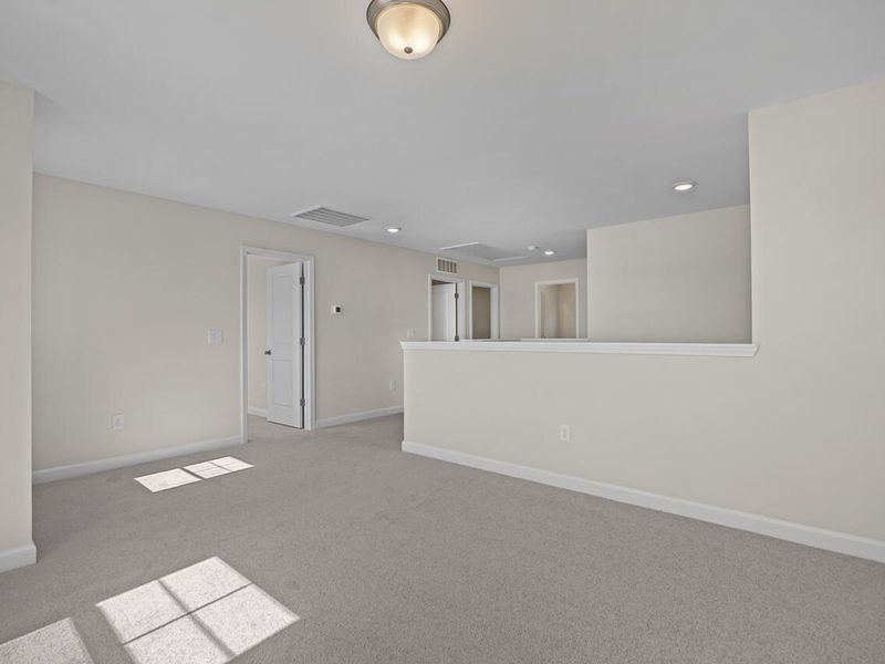 Spacious, unfurnished interior of a new home in Woodland Crossing, Zebulon (Image 22).
